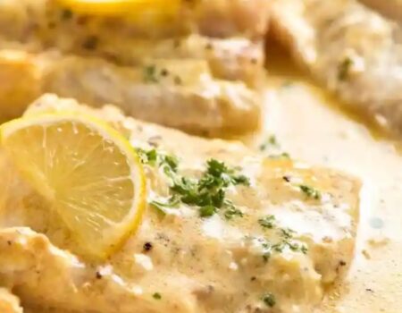 Hake in creamy onion